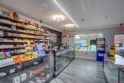 686 Broadway, Raynham — storefront and interior